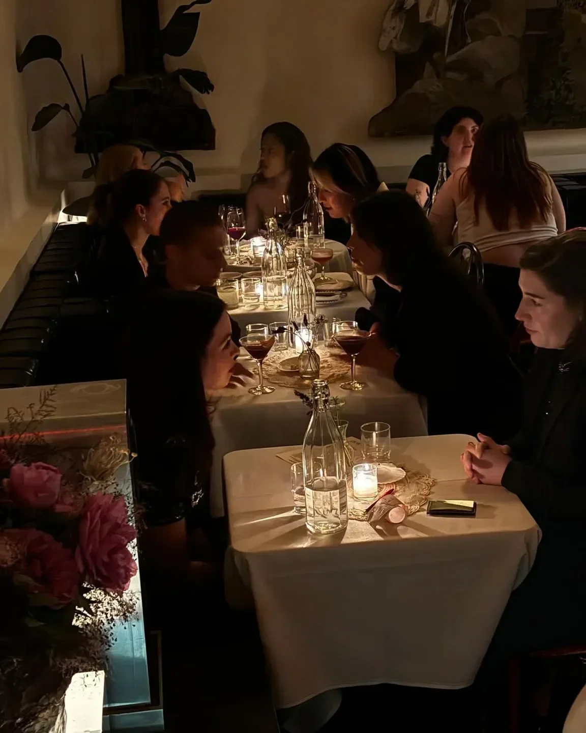 Elegant dining at Casino in New York City, people enjoying drinks at the restaurant.