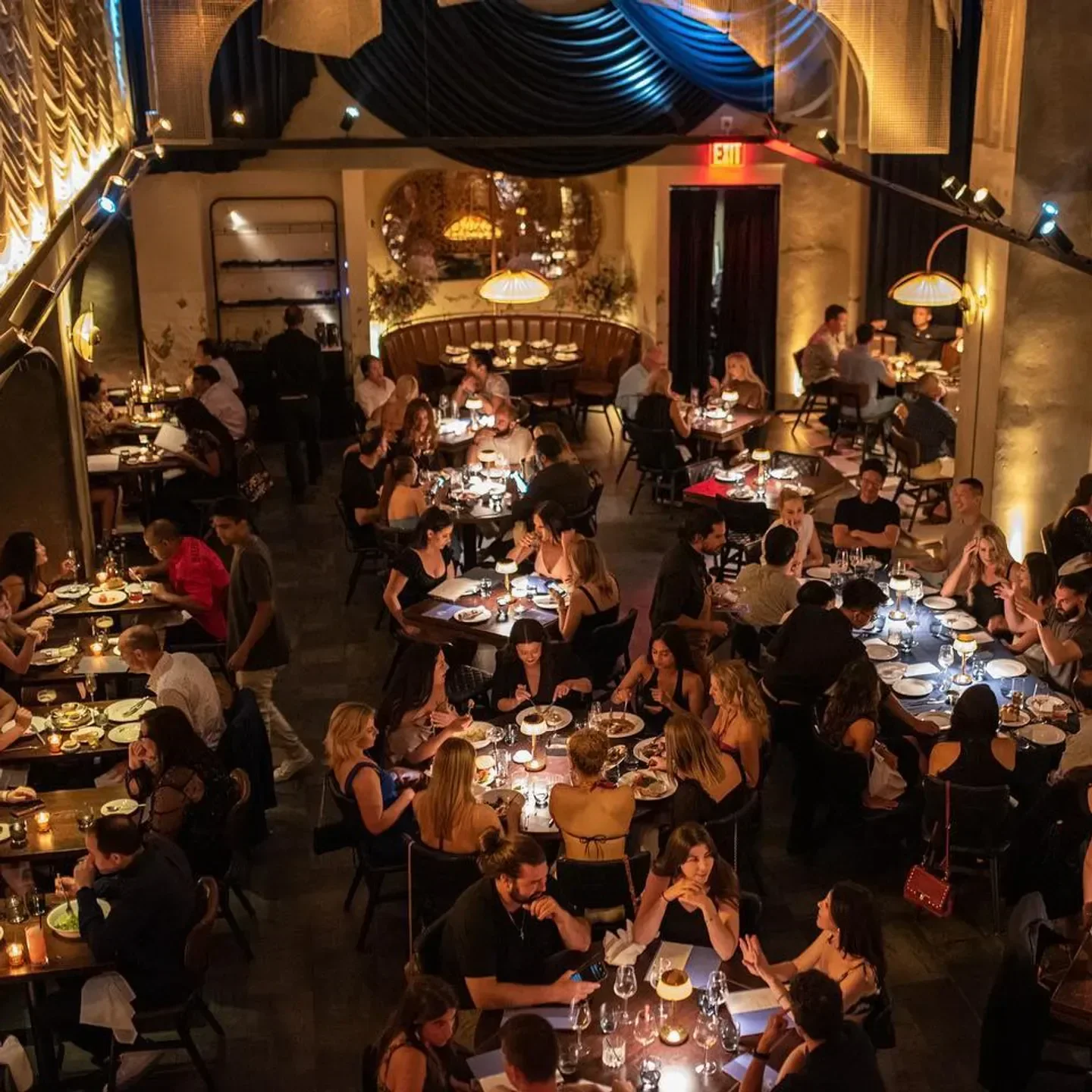 Dining at Cathedrale in New York City, a vibrant restaurant scene with elegant decor.