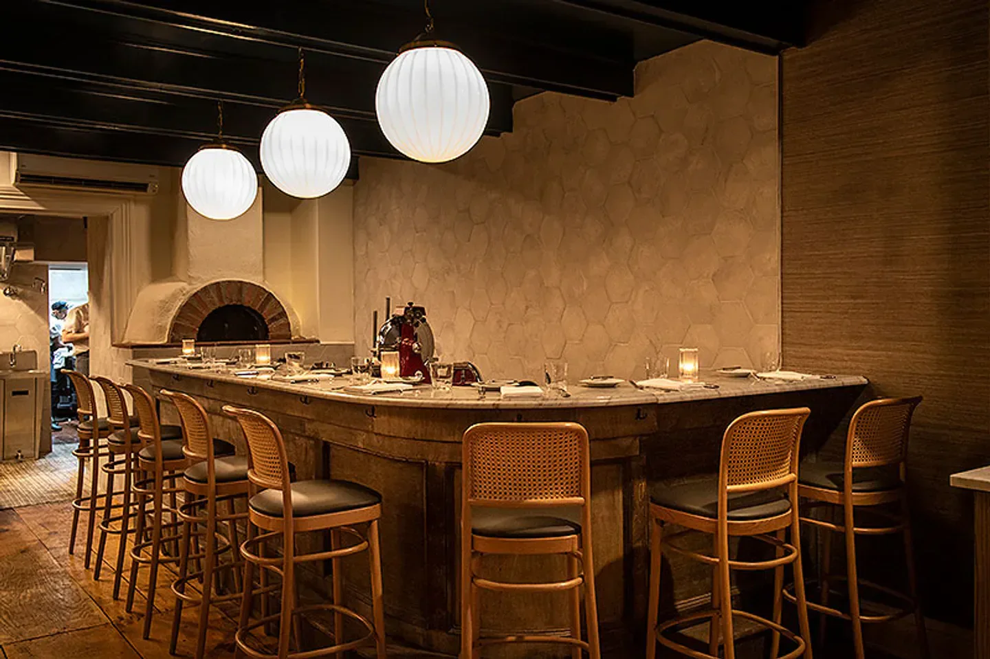 Elegant bar at da Toscano in New York City with stylish lighting and seating