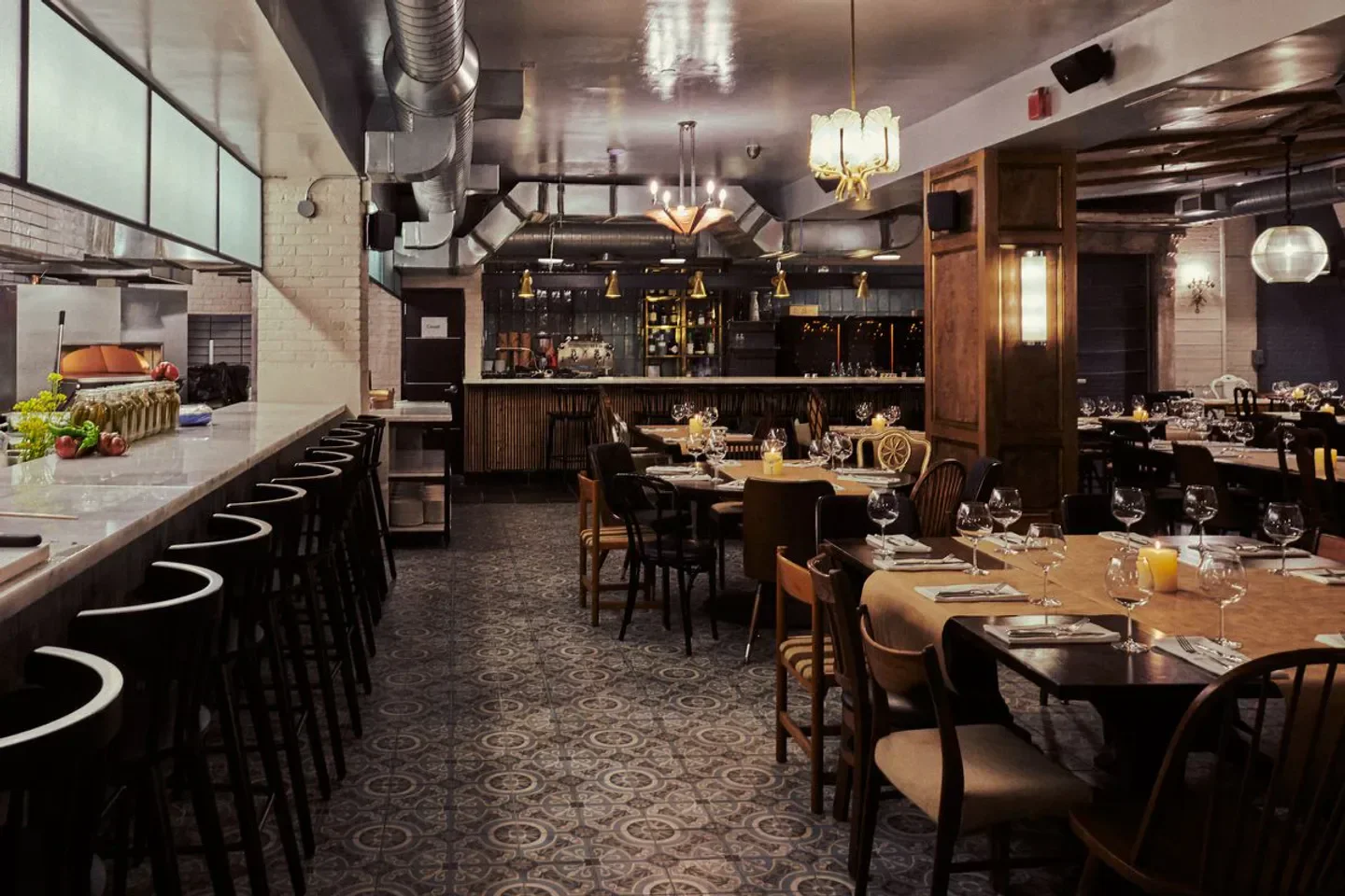 Elegant dining area at HaSalon in New York City with bar and tables.