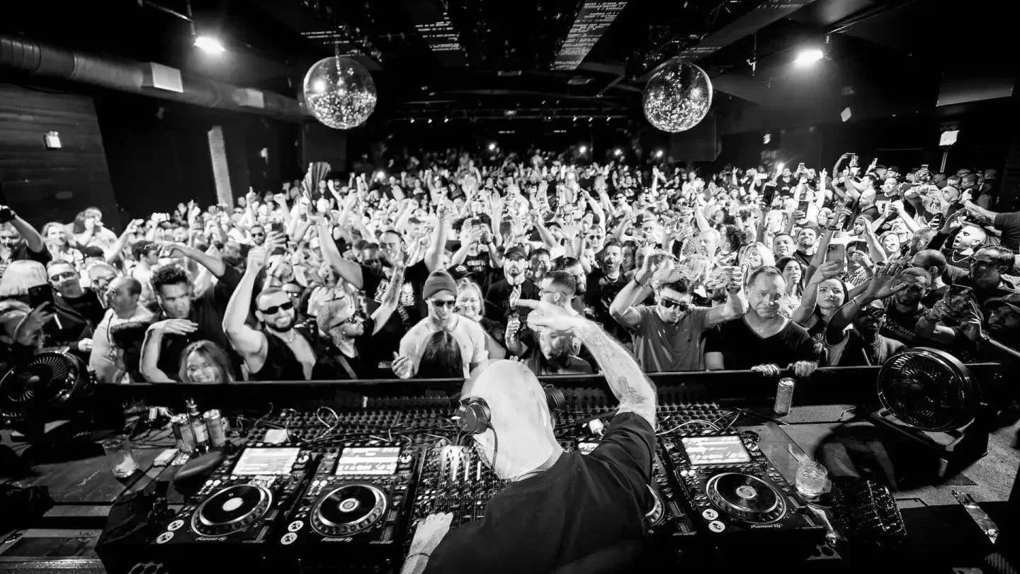 DJ at MUSICA Club in New York City with a crowd enjoying the nightclub.