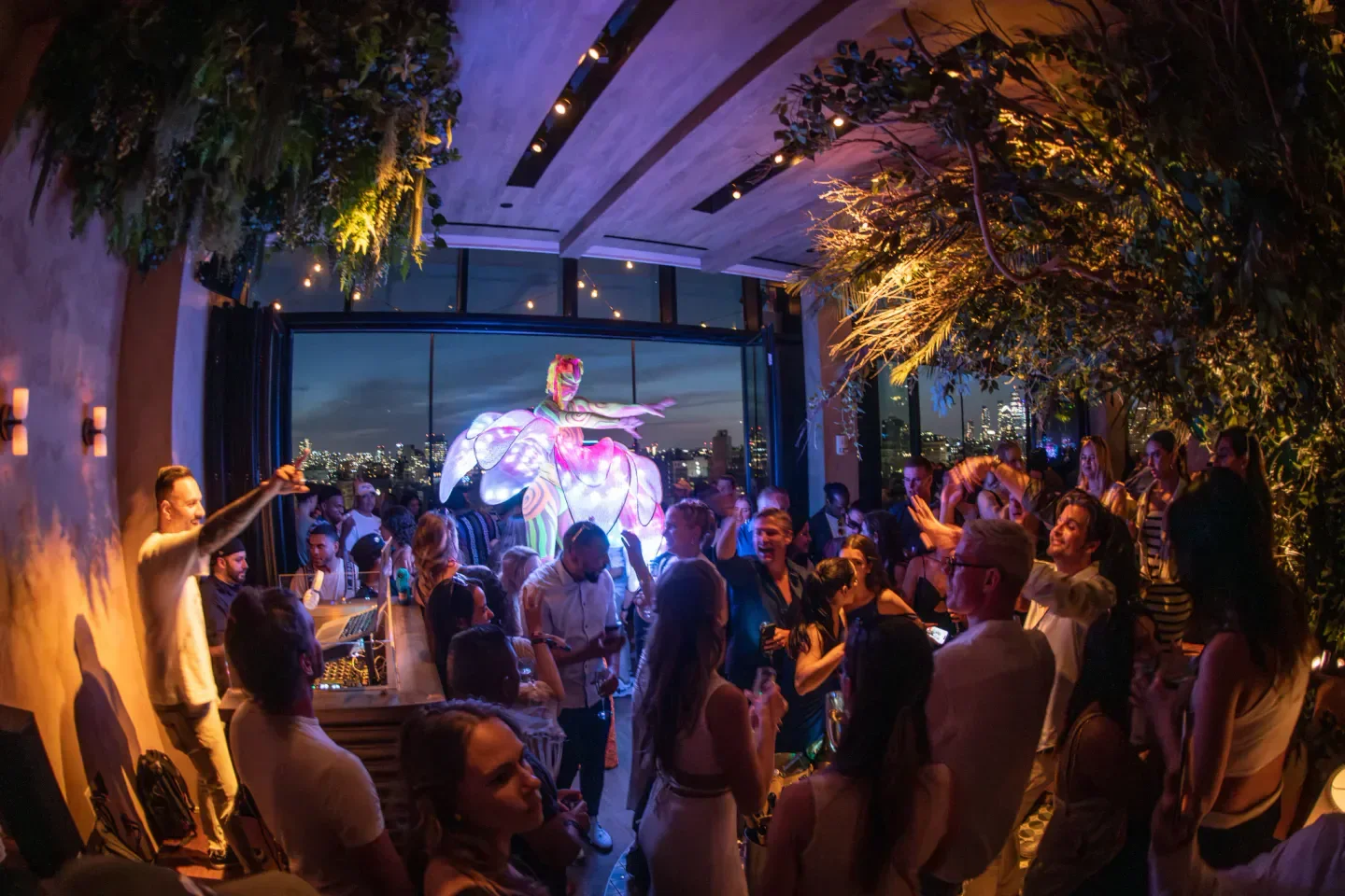 The Highlight Room, restaurant in New York City, featuring a vibrant show and city views.