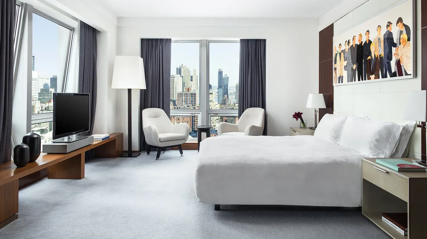 Luxury hotel room at The Langham, New York, Fifth Avenue, with New York City views.