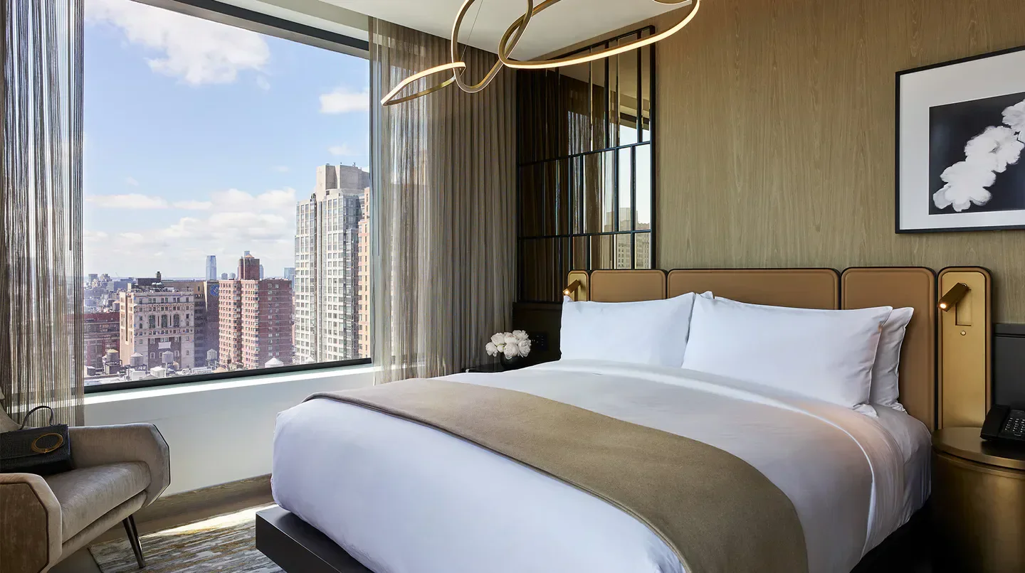 Luxury bedroom at The Ritz-Carlton New York, NoMad with a New York City view
