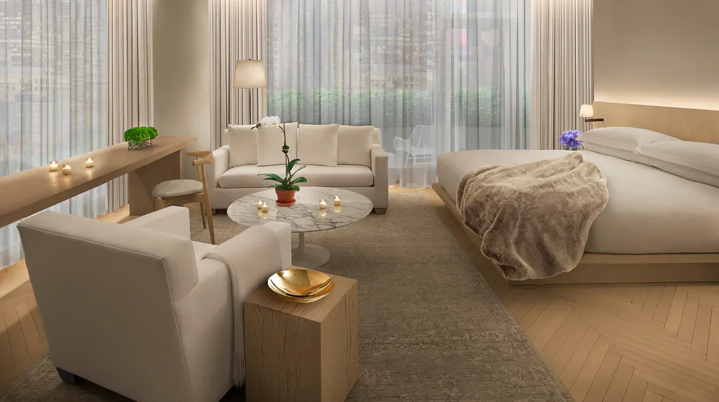 Cozy hotel room at The Times Square EDITION in New York City with luxurious decor