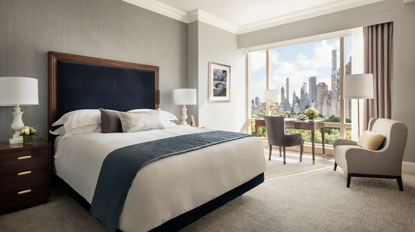 Elegant bedroom at Trump International Hotel & Tower New York with city views of New York City.