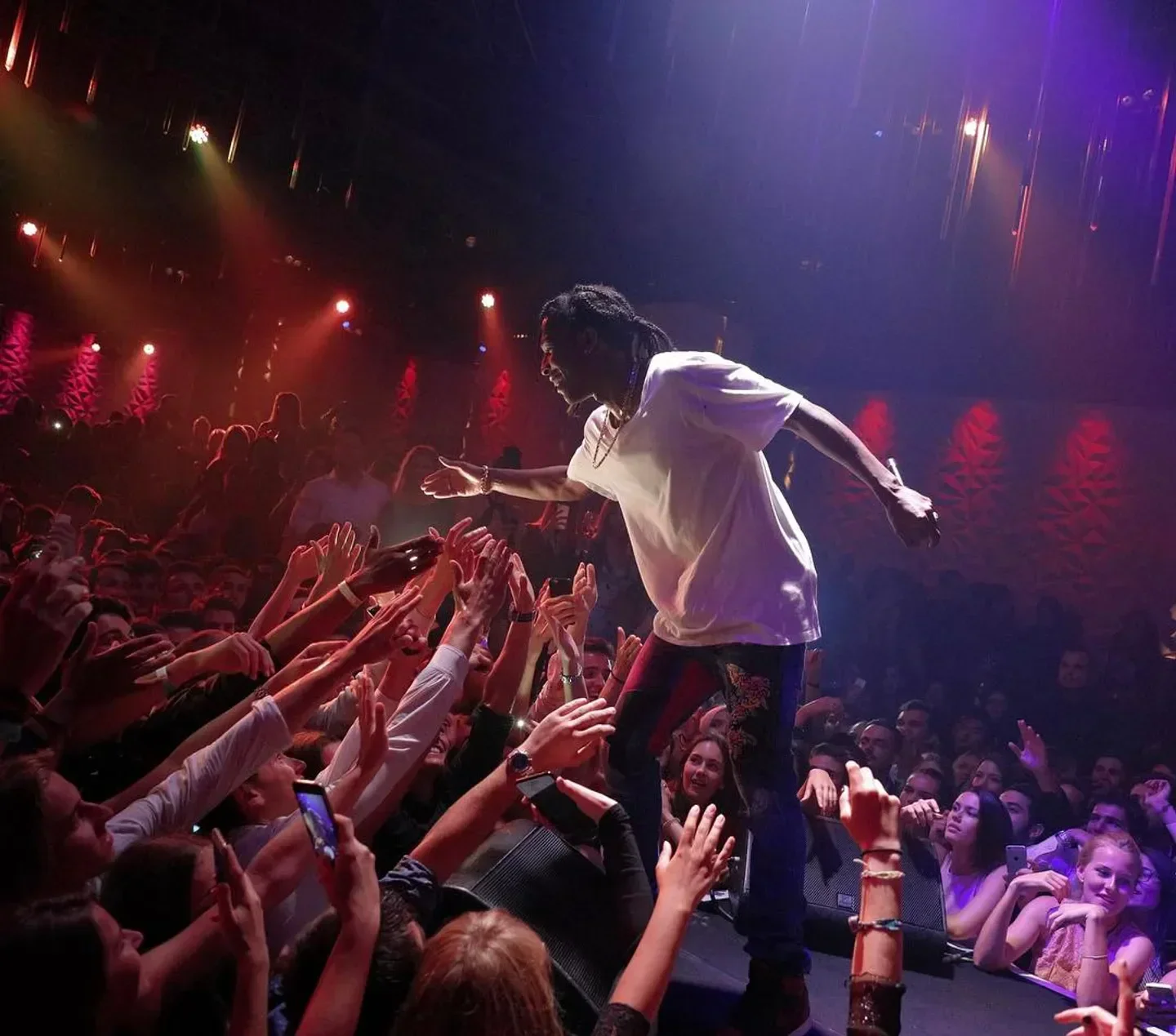 Energetic performance at Up and Down nightclub in New York City with crowd interaction
